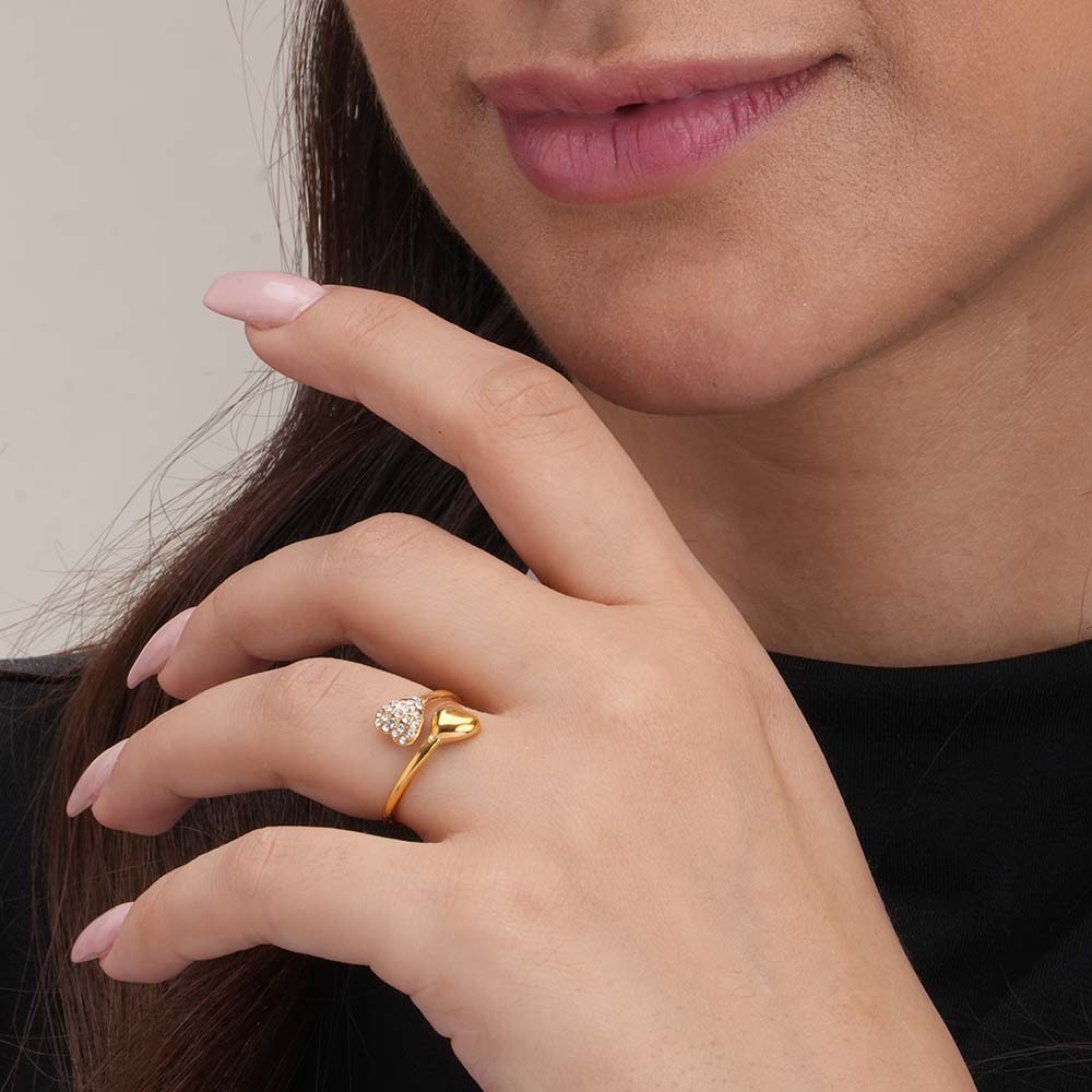 Gold Heart-Shaped Ring with Gemstone Accents.