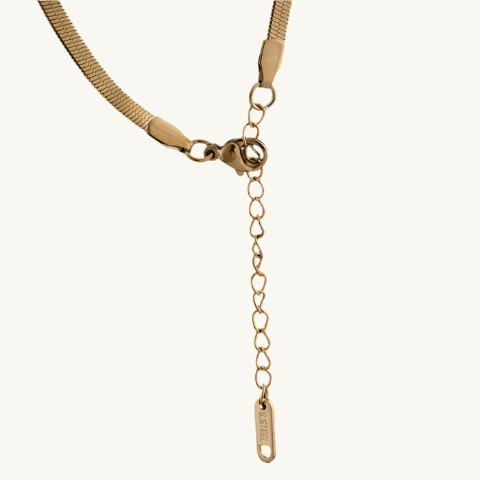 Close-up of Bold V necklace clasp and adjustable chain, highlighting durable stainless steel construction and fine detailing.