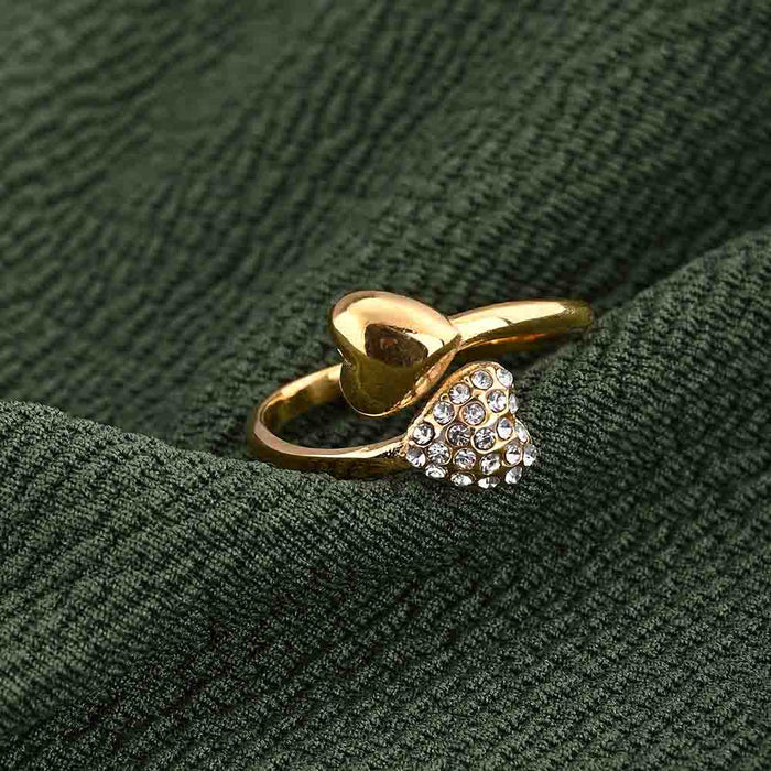 Gold Heart-Shaped Ring with Gemstone Accents.