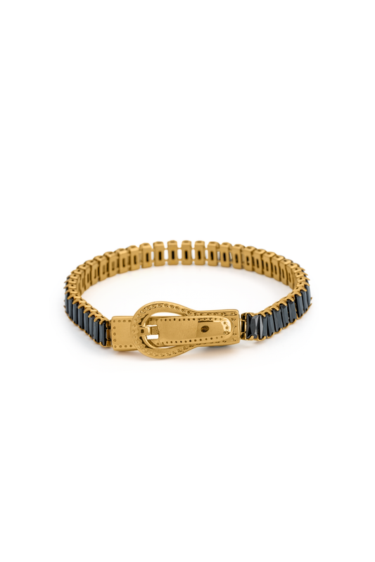 Close-up of Baguette Tennis Bracelet featuring gold buckle clasp and black baguette stones, ideal for luxury fashion accessories.