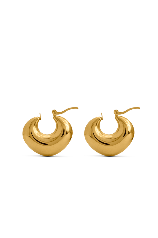 Luna Bold Gold Hoops featuring a thick, crescent-shaped design with a polished finish, ideal for statement jewelry lovers.