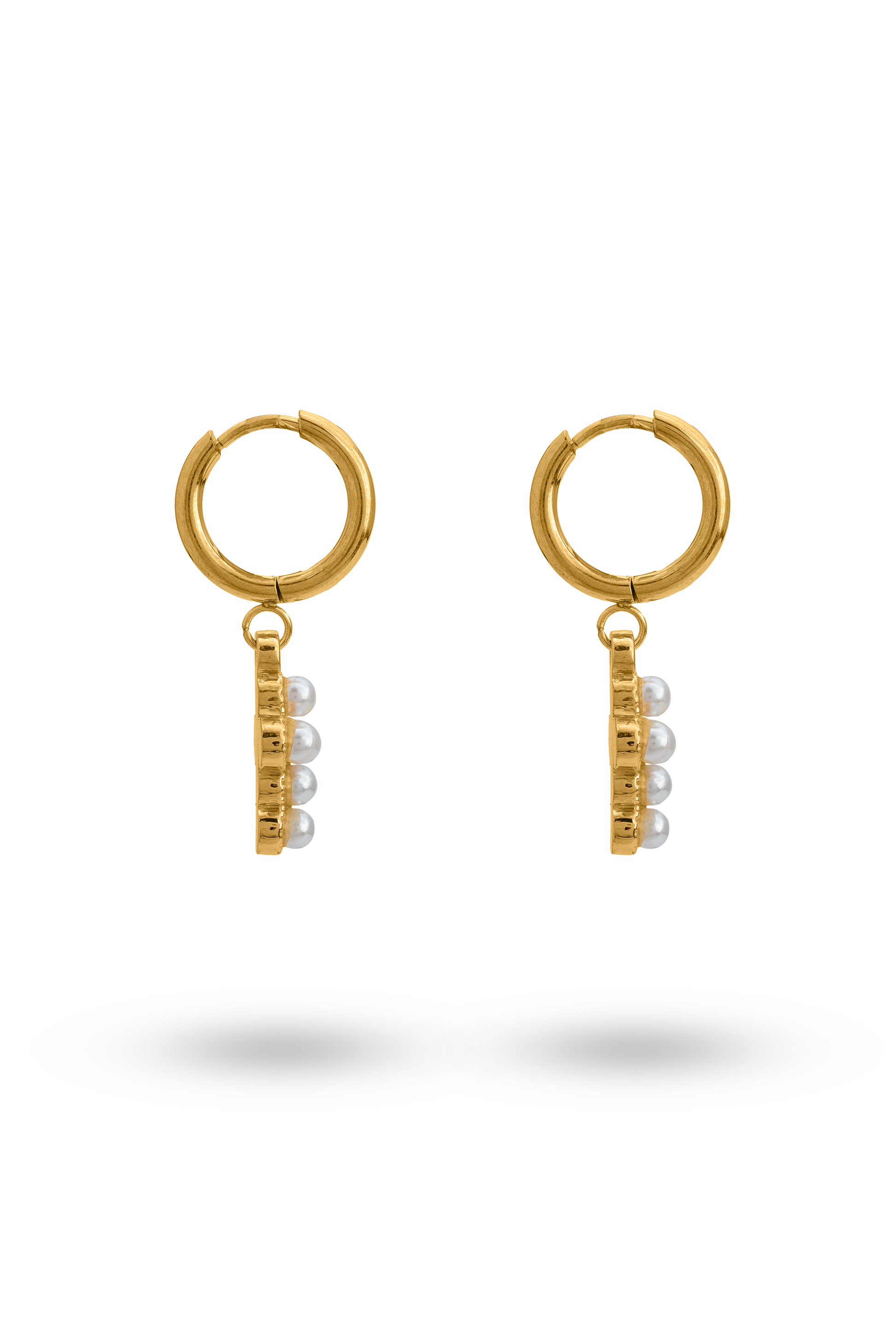 Side view of Grace Pearl Hoops highlighting the gold hoop and vertical pearl cross design, a refined accessory for everyday elegance.