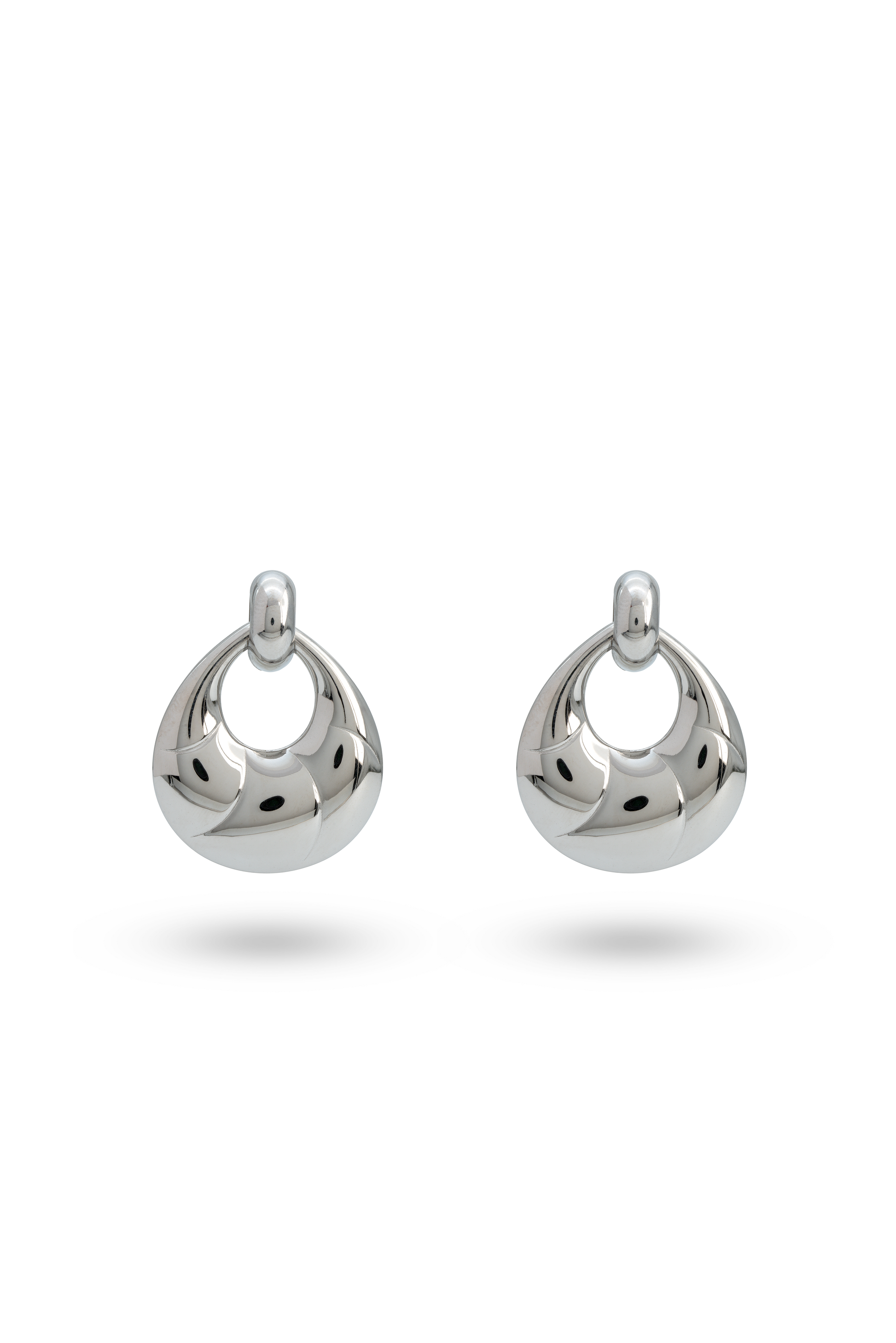 Twirléa Sterling Hoops in polished silver finish with a sculptural, twisted design. Elegant earrings for modern jewelry collections.
