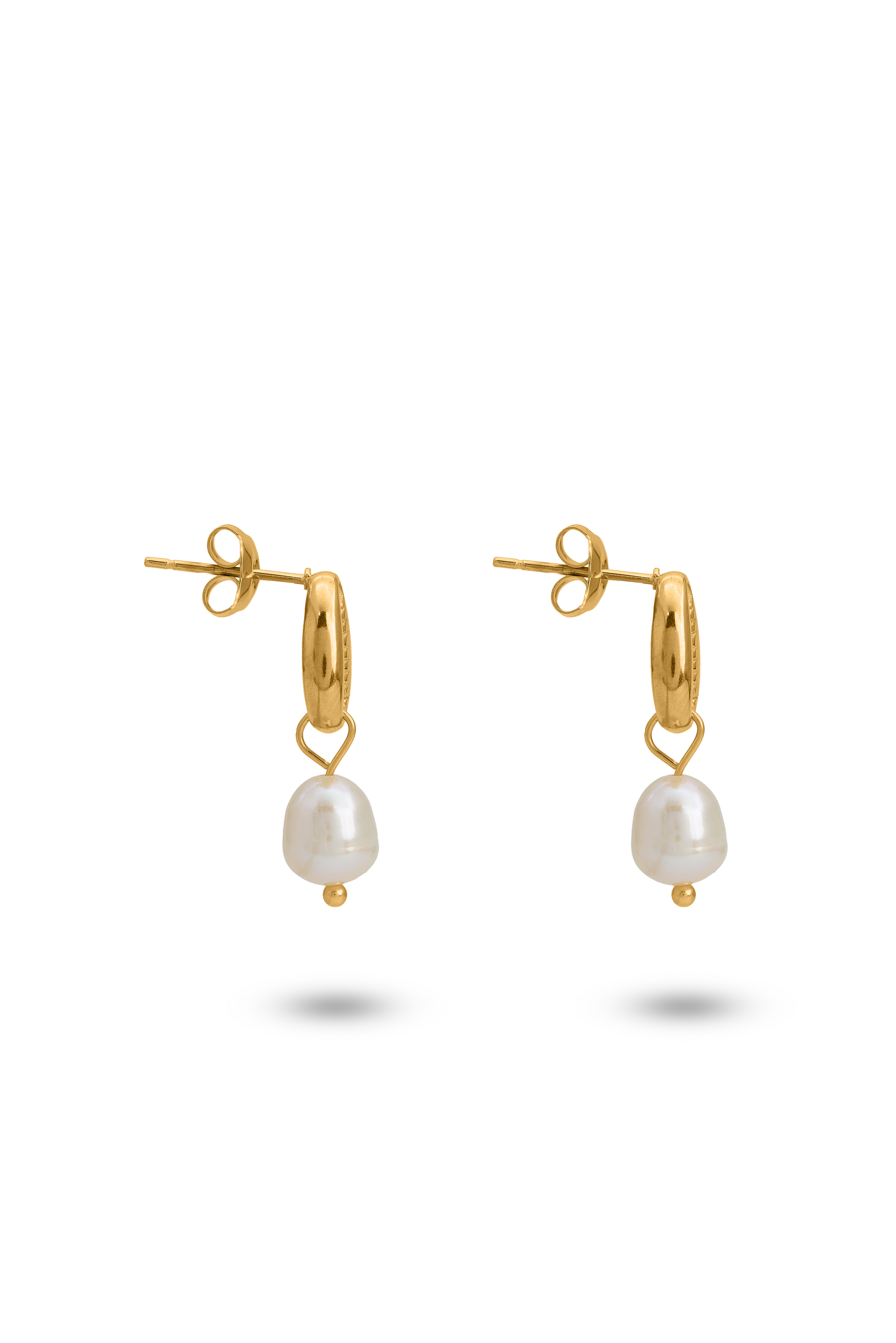 Side view of Ocean's Embrace Pearl Earrings with gold cowrie shell and pearl drop, highlighting fine craftsmanship in luxury beach jewelry.
