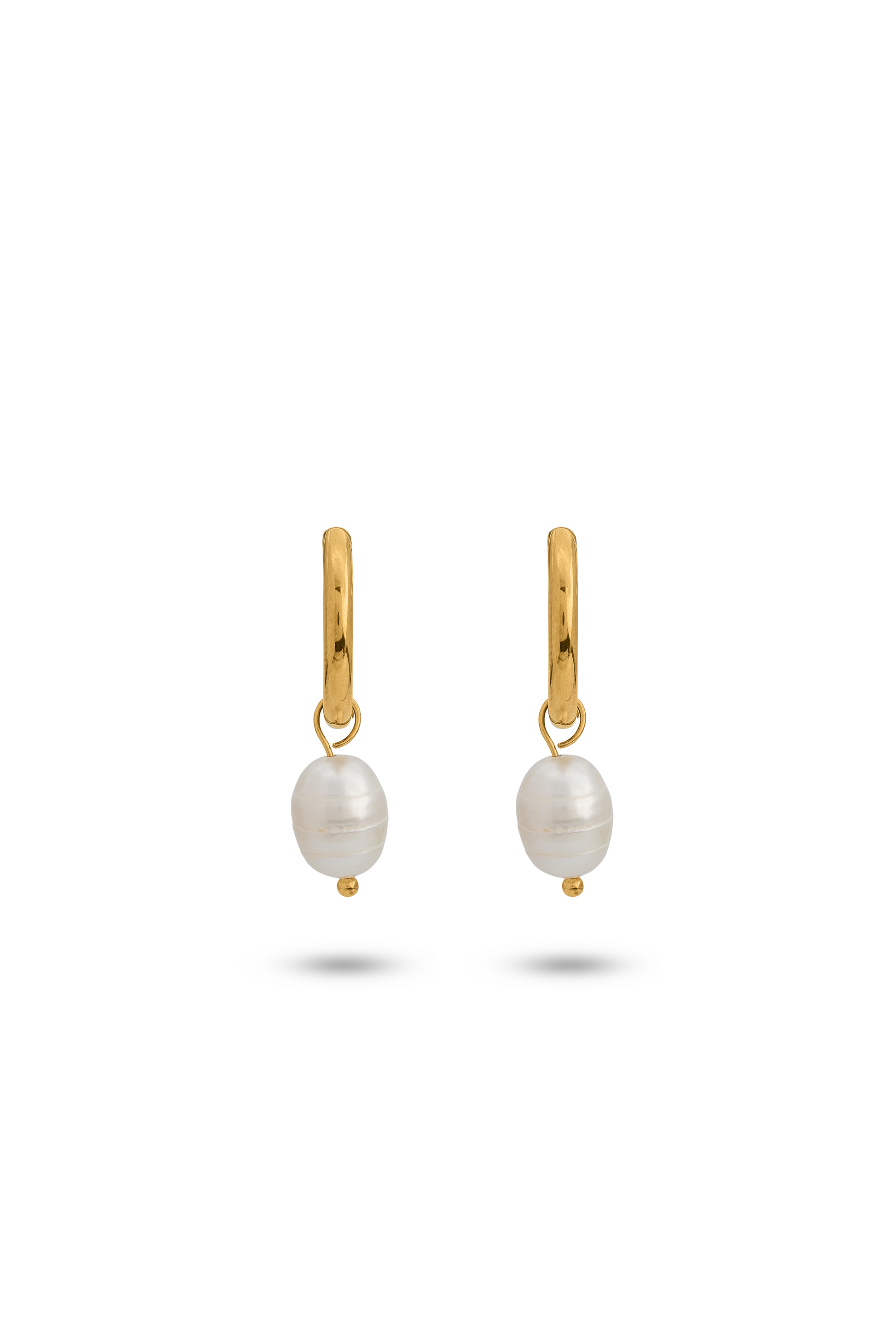 Close-up of Luna Pearl Drop Earrings with minimalist gold hoops and single white pearl drops, perfect for everyday elegance.