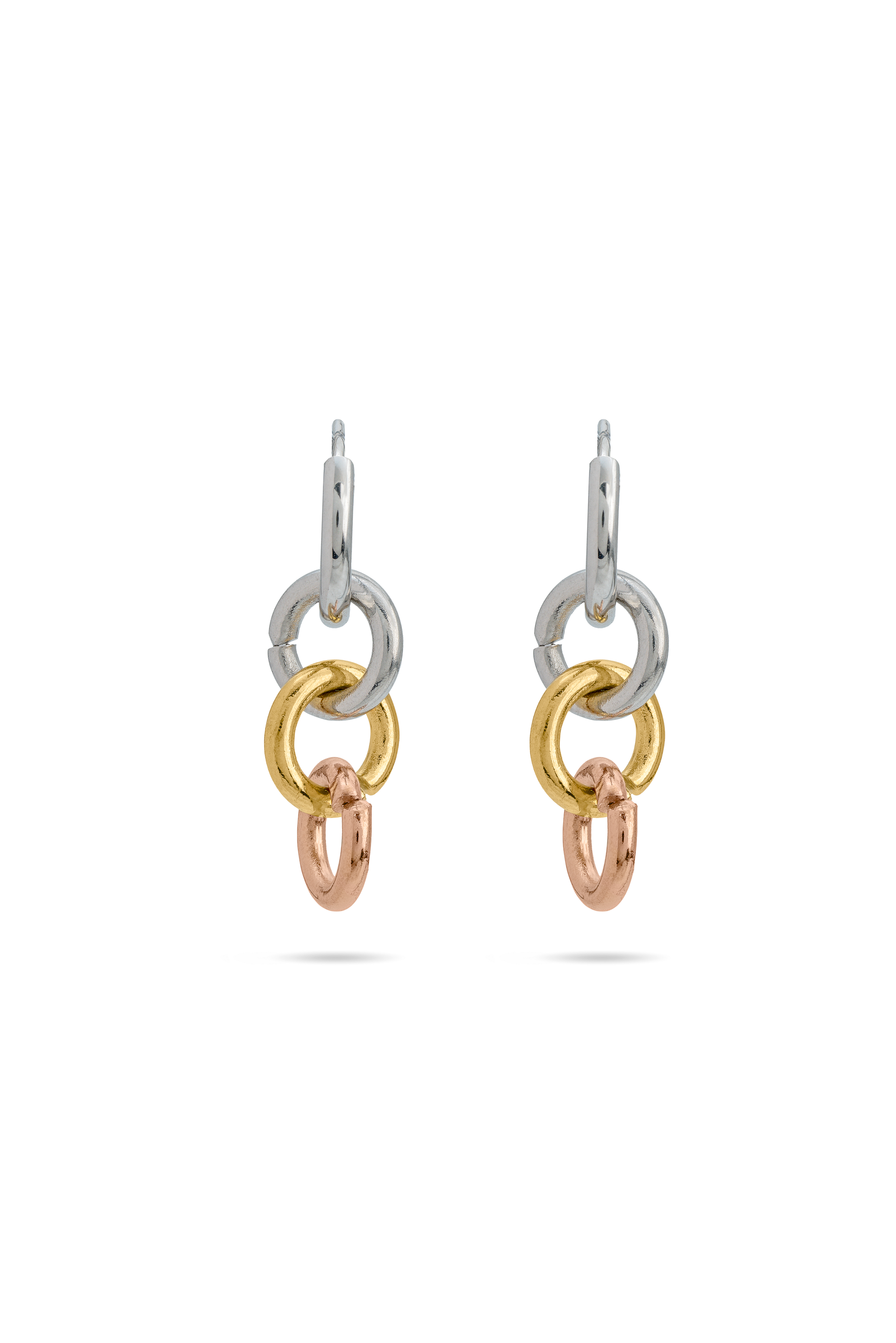 Close-up of Harmony Hoops earrings with three-tone metal rings. Elegant and versatile jewelry in the Earrings category.