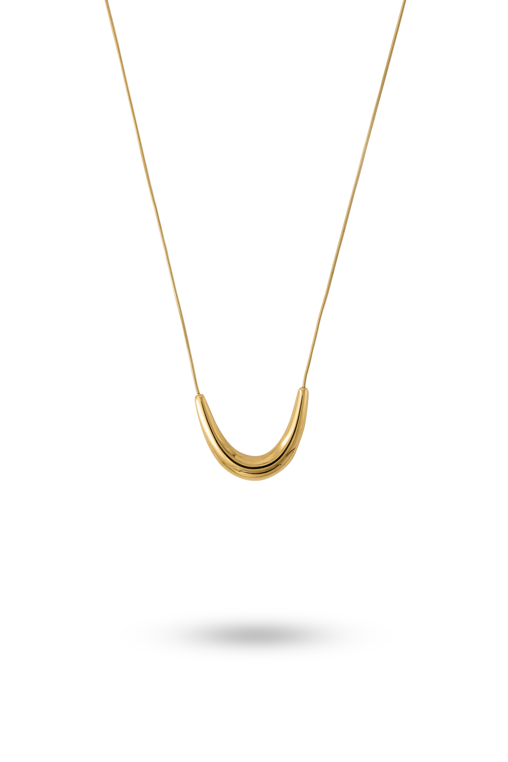 The Arc gold necklace featuring a sleek, curved pendant on a fine chain, ideal for minimalist jewelry lovers in the necklaces category.
