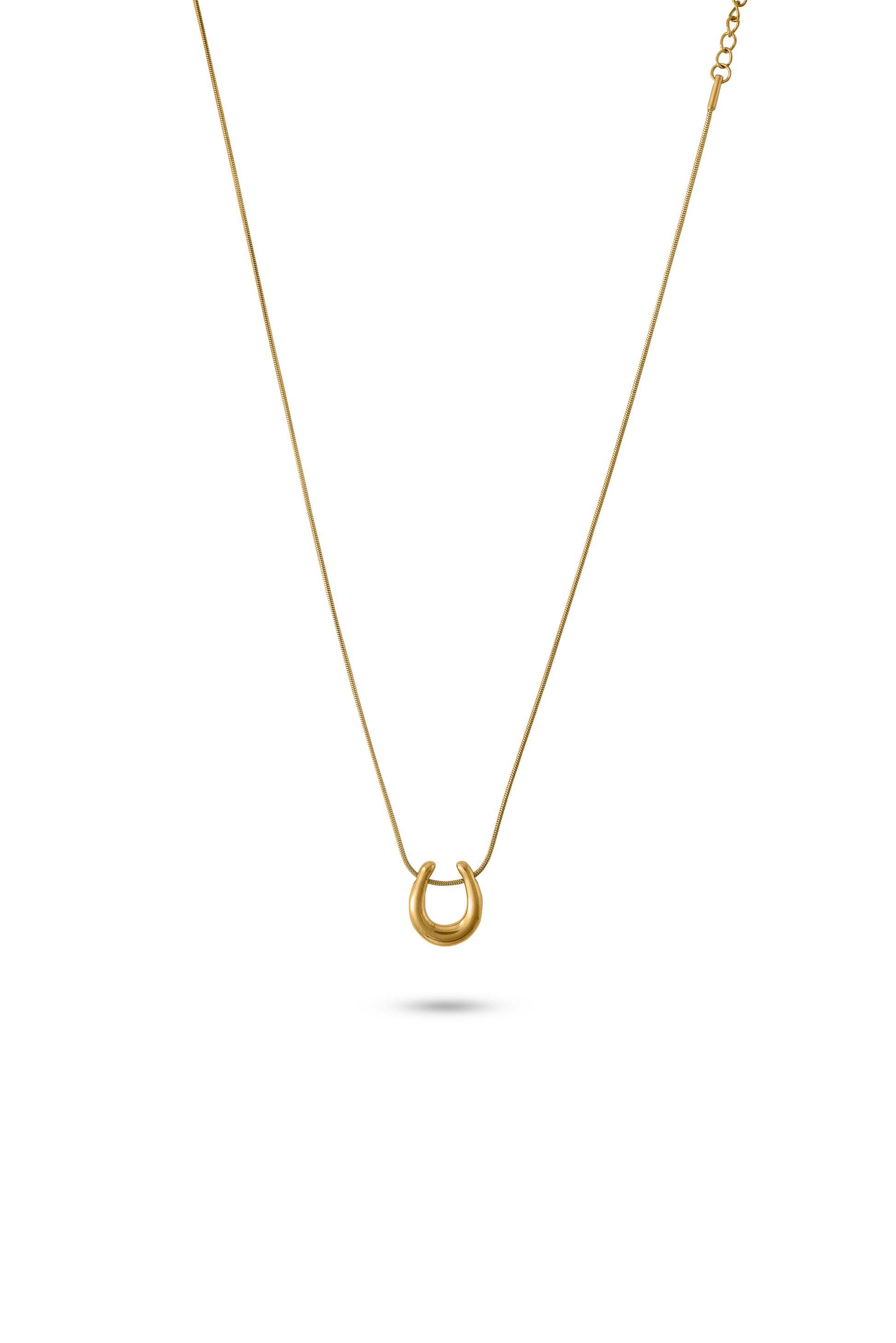 Luna Charm Necklace in gold with a minimalist crescent pendant, displayed on a white background for jewelry product showcase.