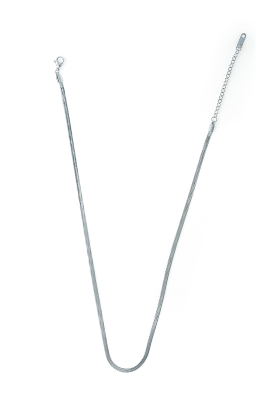 Luxe Snake Chain necklace laid flat with clasp and extender visible, highlighting its smooth silver finish and adjustable length.