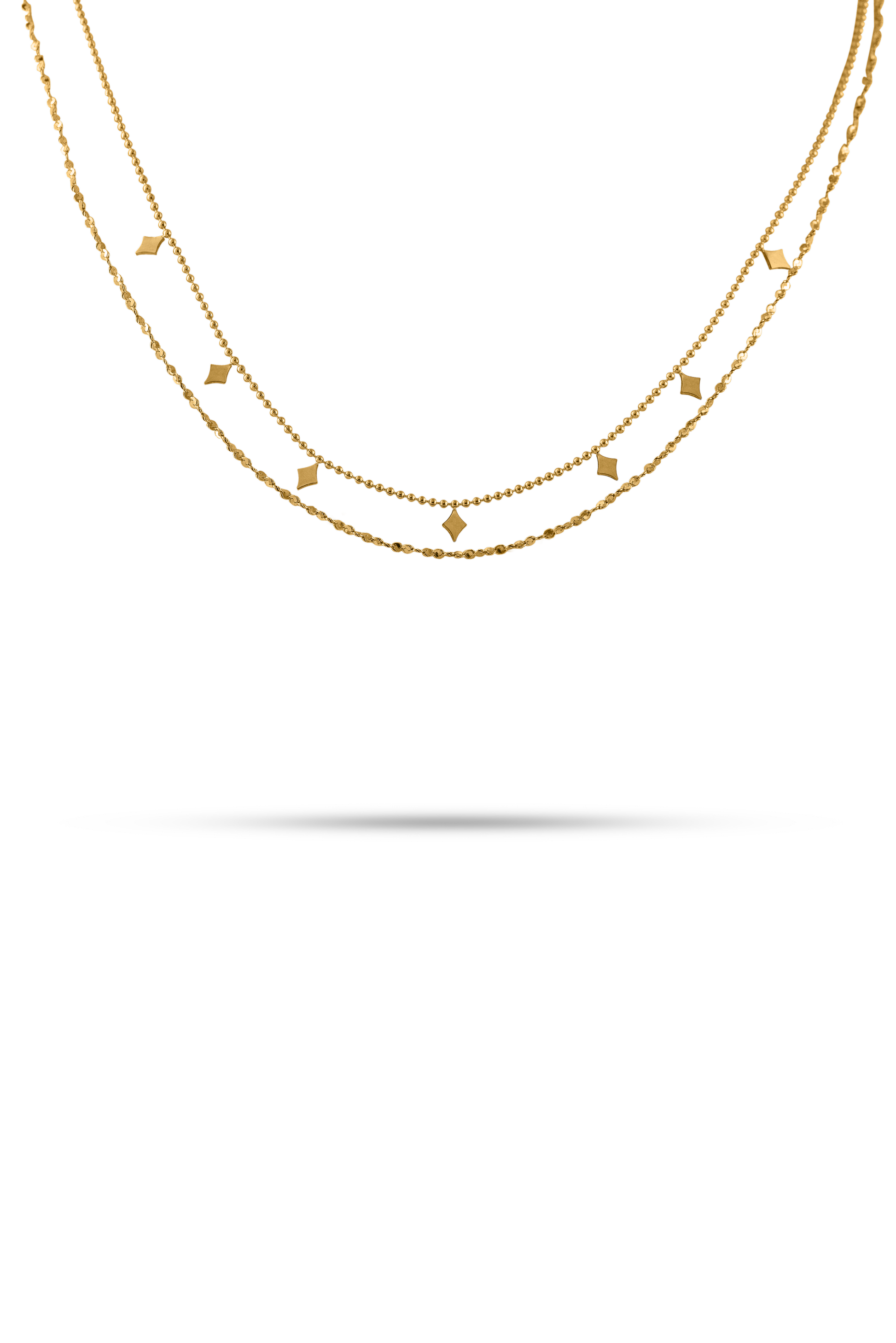 Dusk Gleam Layered Chain featuring dual gold chains with geometric accents, ideal for elegant layering in women's fashion jewelry collections.